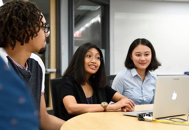 students looking at a computer