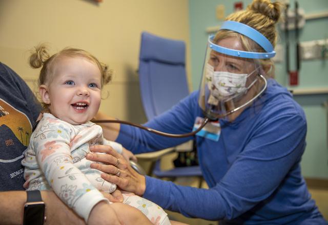 Anesthesia care team member with a patient