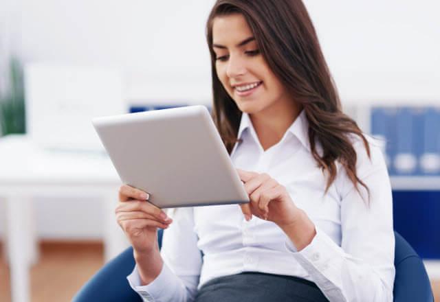 woman browsing on tablet