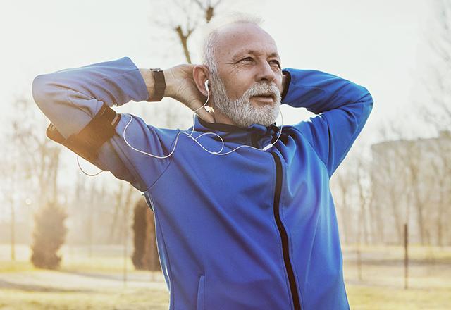 active senior male stretching