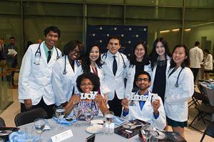 Group of Alumni Sitting Around Table