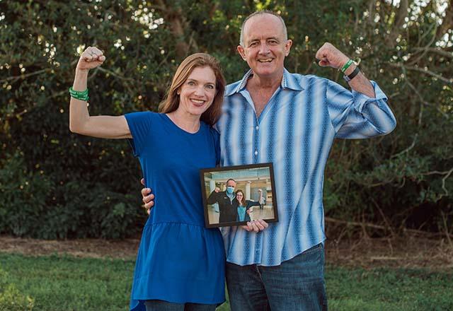 Neil posing with his wife Lisa